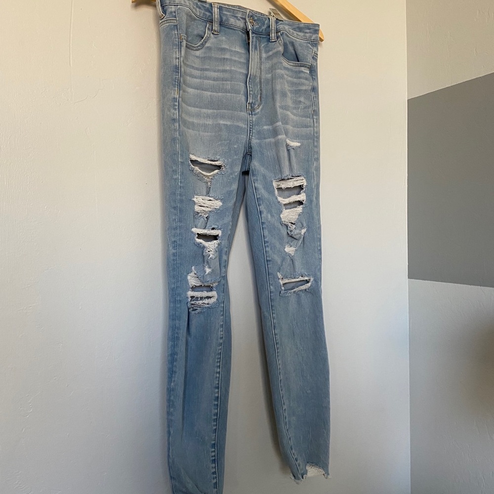 Ripped light wash skinny jeans